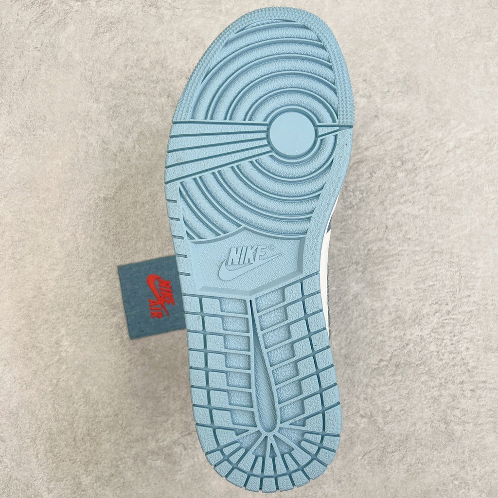 Light blue rubber outsole with Nike Air logo and circular traction grooves