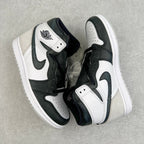 High-top sneakers with white, black, and dark green color blocking and side Swoosh logo