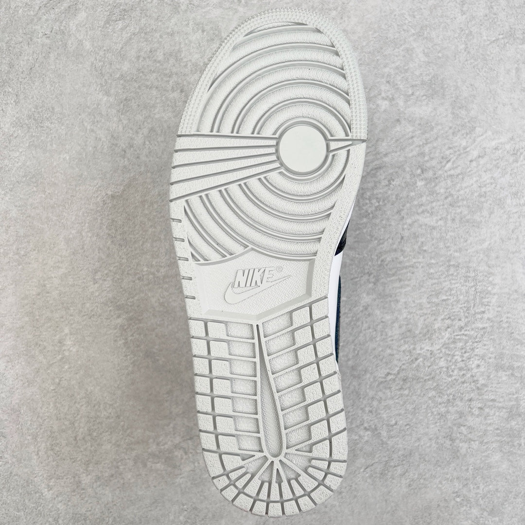White rubber outsole with circular traction pattern and grid herringbone lines