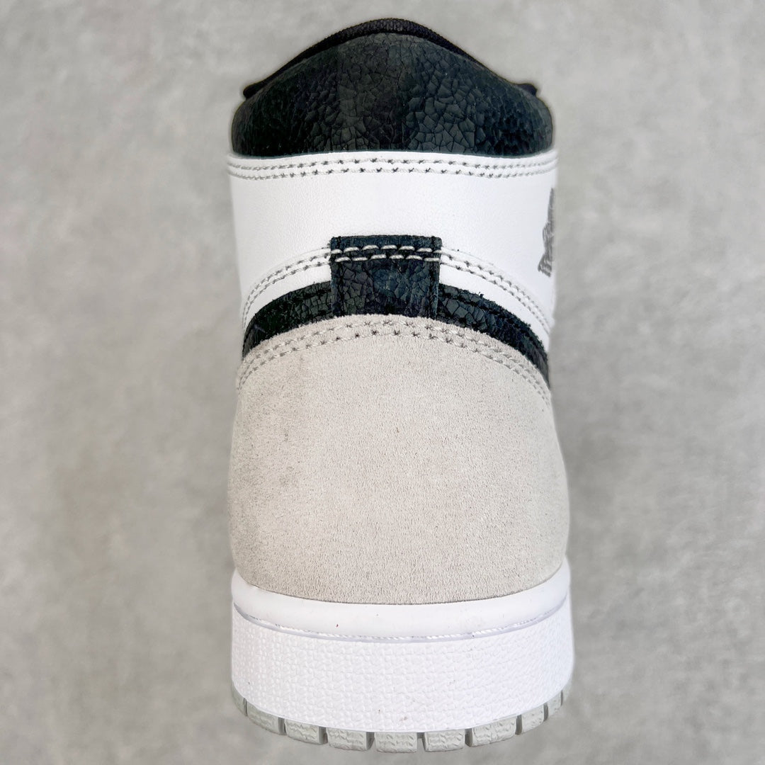 High-top sneakers back view with white midsole and white heel trim