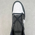High-top sneakers with perforated white toe panel and dark lace-up front