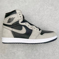 High-top sneakers with cream leather panels, navy accents, and Nike swoosh.