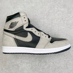 High-top sneakers with cream leather panels, navy accents, and Nike swoosh.