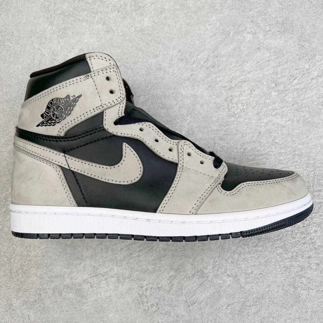 High-top sneakers with cream leather panels, navy accents, and Nike swoosh.
