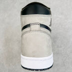 High-top sneaker back with cream heel panel, navy collar lining, and white midsole.