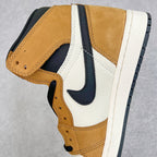 High-top sneaker side and toe with tan overlays, white leather panels, and navy swoosh.