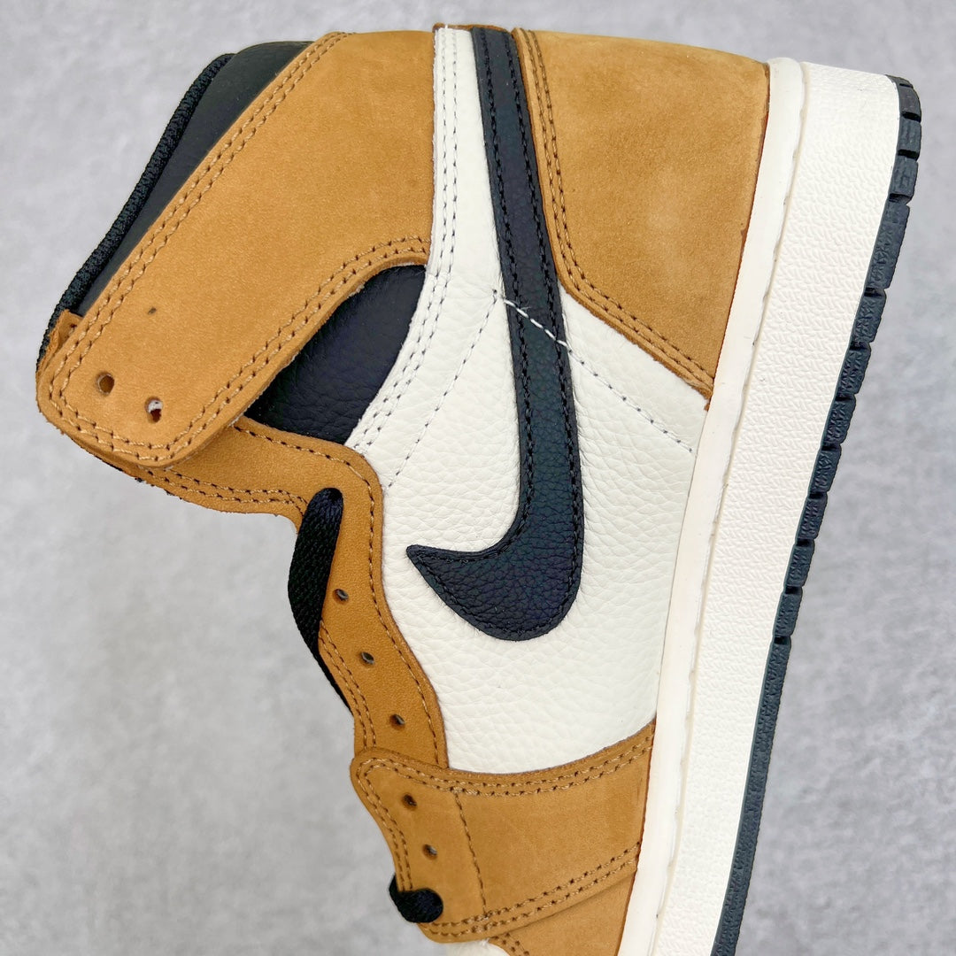 High-top sneaker side and toe with tan overlays, white leather panels, and navy swoosh.