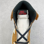High-top sneaker tongue and heel with Nike Air label, navy laces, tan suede, black collar.