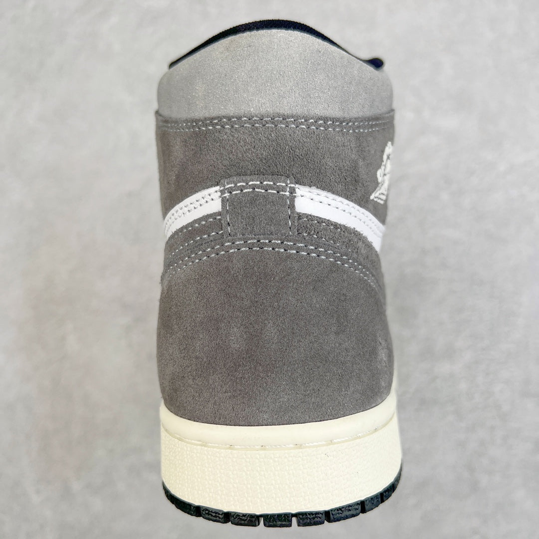 High-top sneaker back view with smoke gray suede, white midsole, black outsole edge.