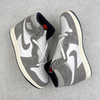 Pair of high-top sneakers in white and smoke gray with gray swoosh and cream midsoles.
