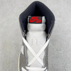 High-top sneaker heel with navy collar lining and white Nike Air tongue tag.