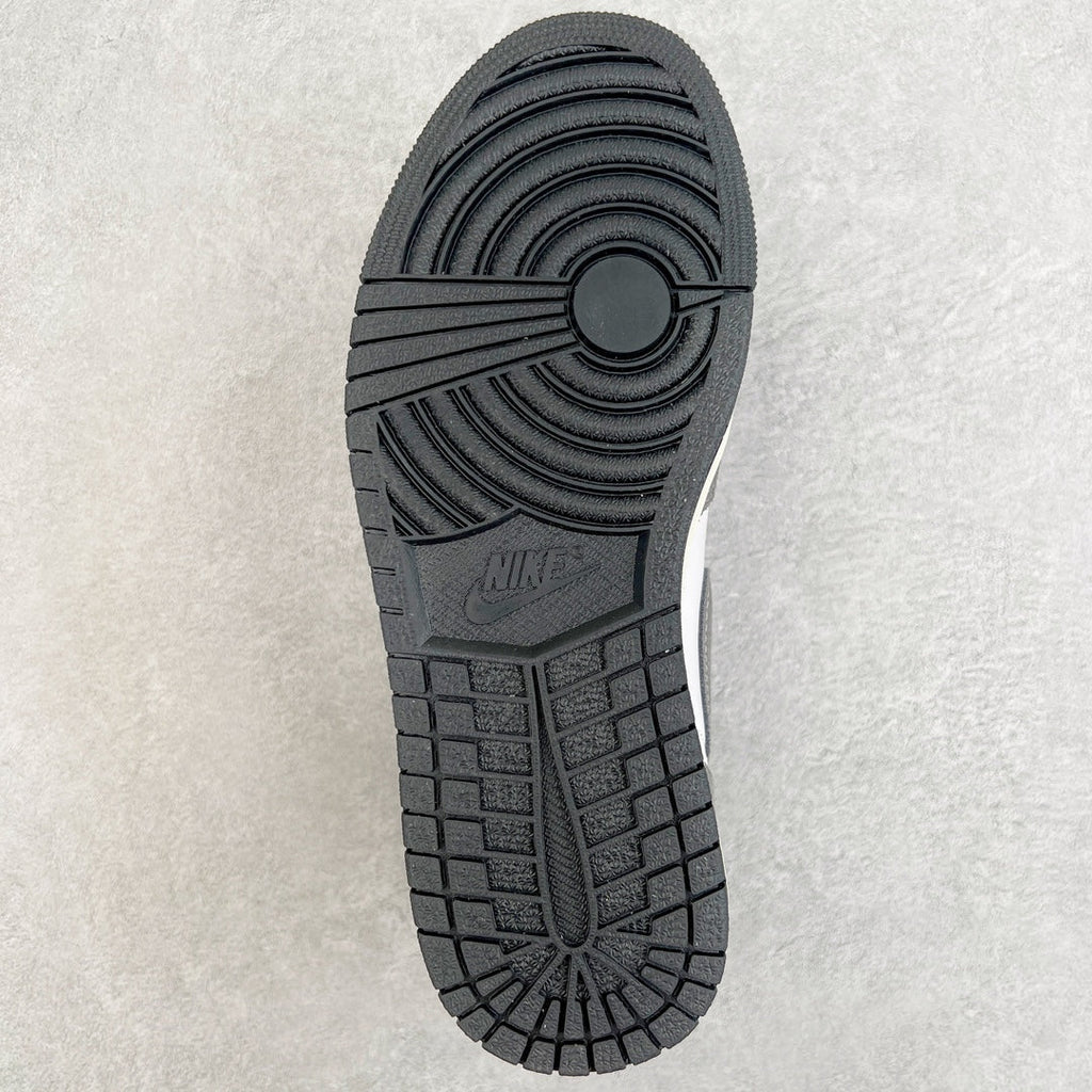 High-top sneaker outsole with black tread and Jordan logo on the heel.