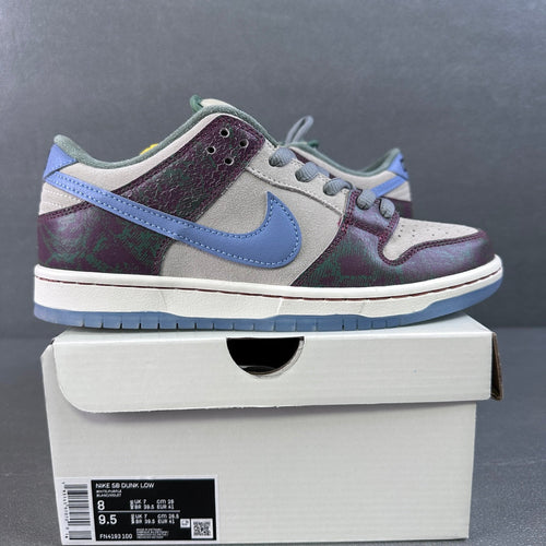 Multicolor low-top skate shoes with light-blue swoosh and white midsole