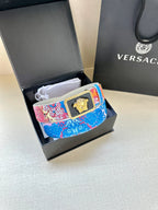 Versace belt in gift box: multicolor patterned strap with gold Medusa buckle