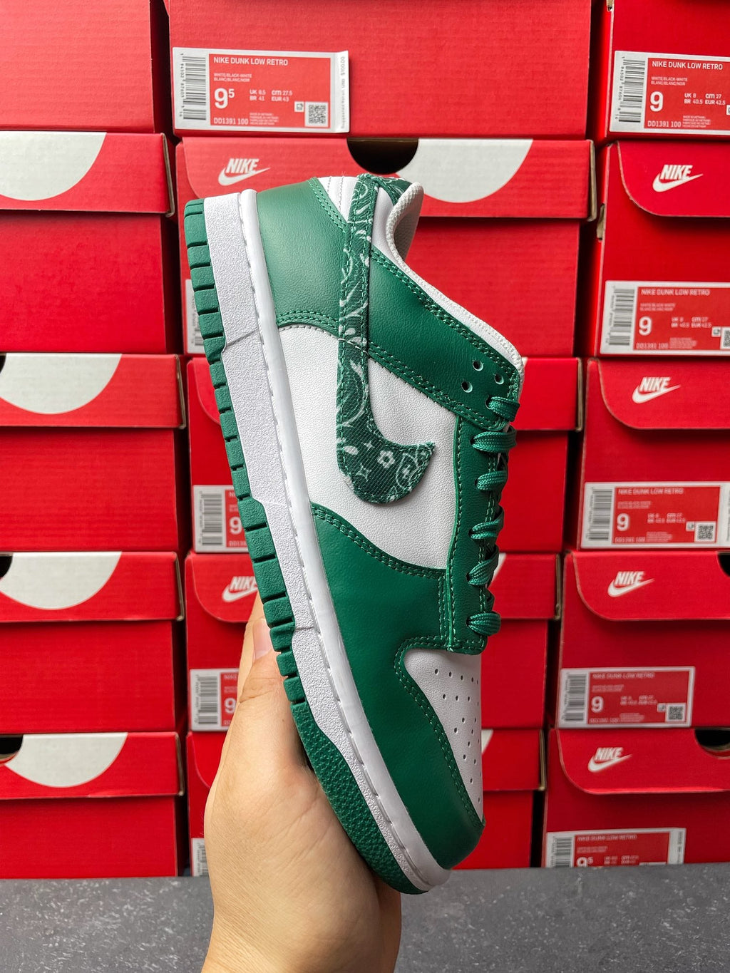 Nike Dunk Low sneaker, green upper with white midsole and patterned green swoosh