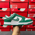 Nike Dunk Low low-top sneaker in green leather with white side panel and green laces