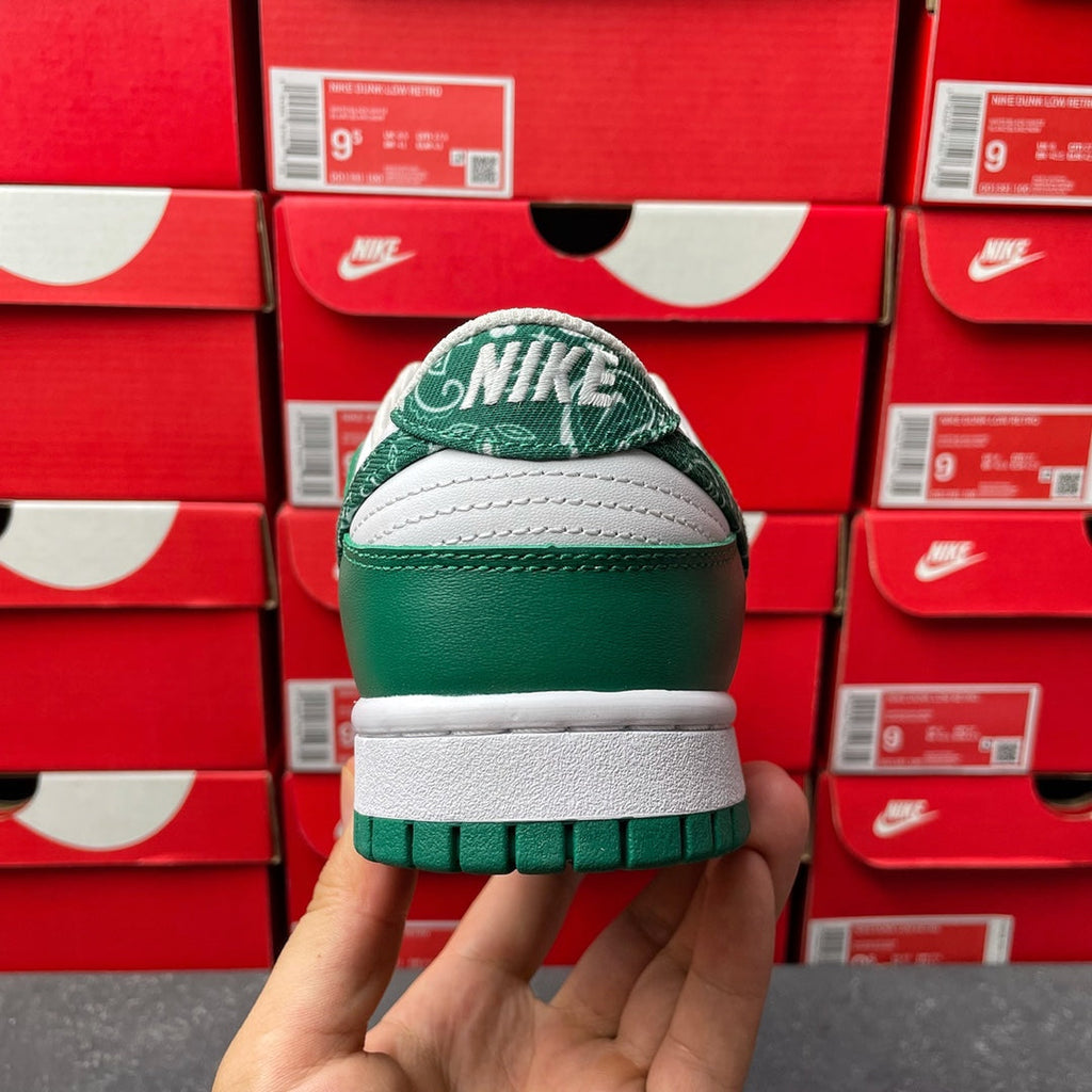 Nike Dunk Low heel view with green leather, white sole, and green stitched logo