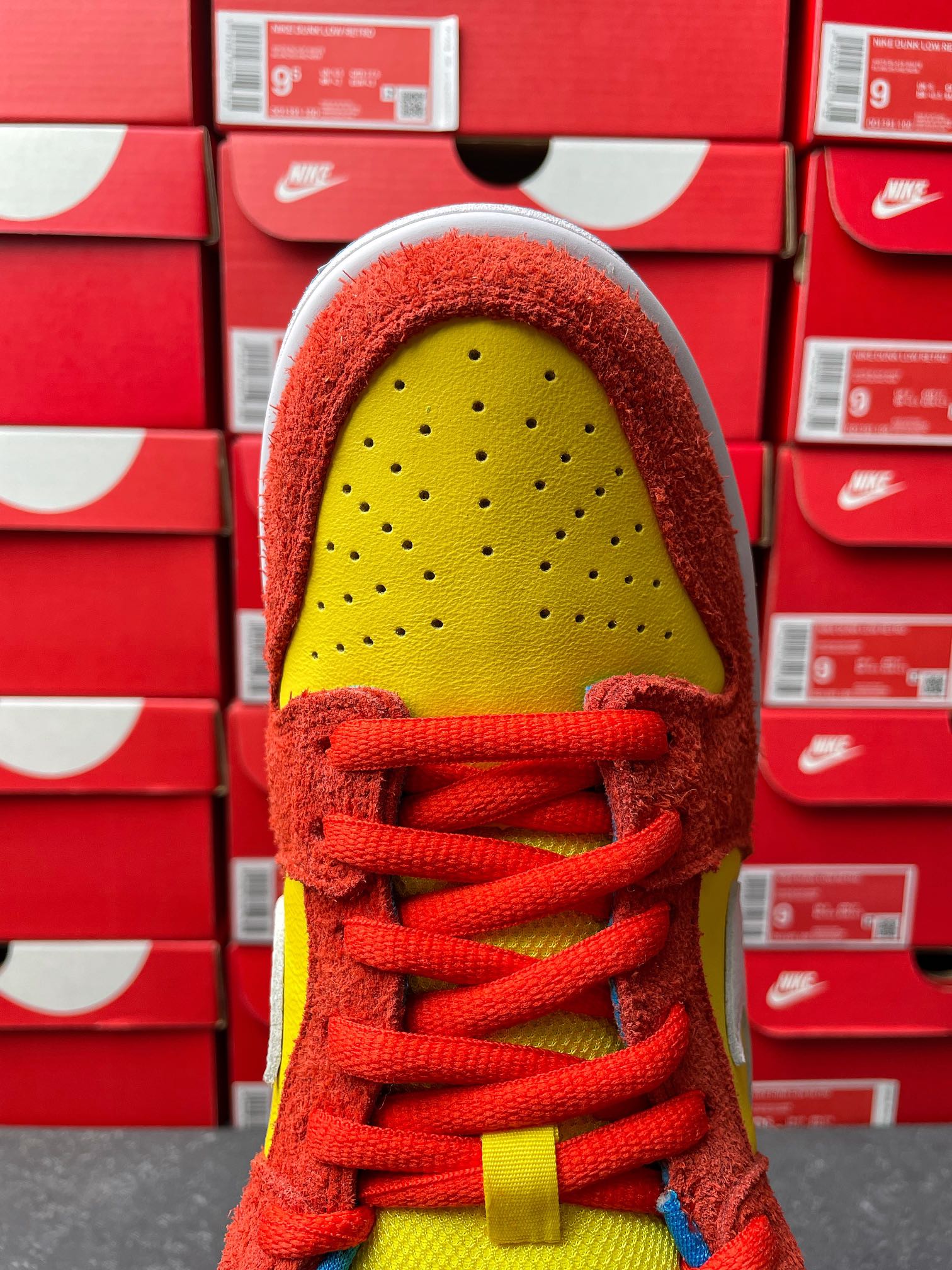 Nike Dunk Low sneaker, interior view with yellow insole and red laces