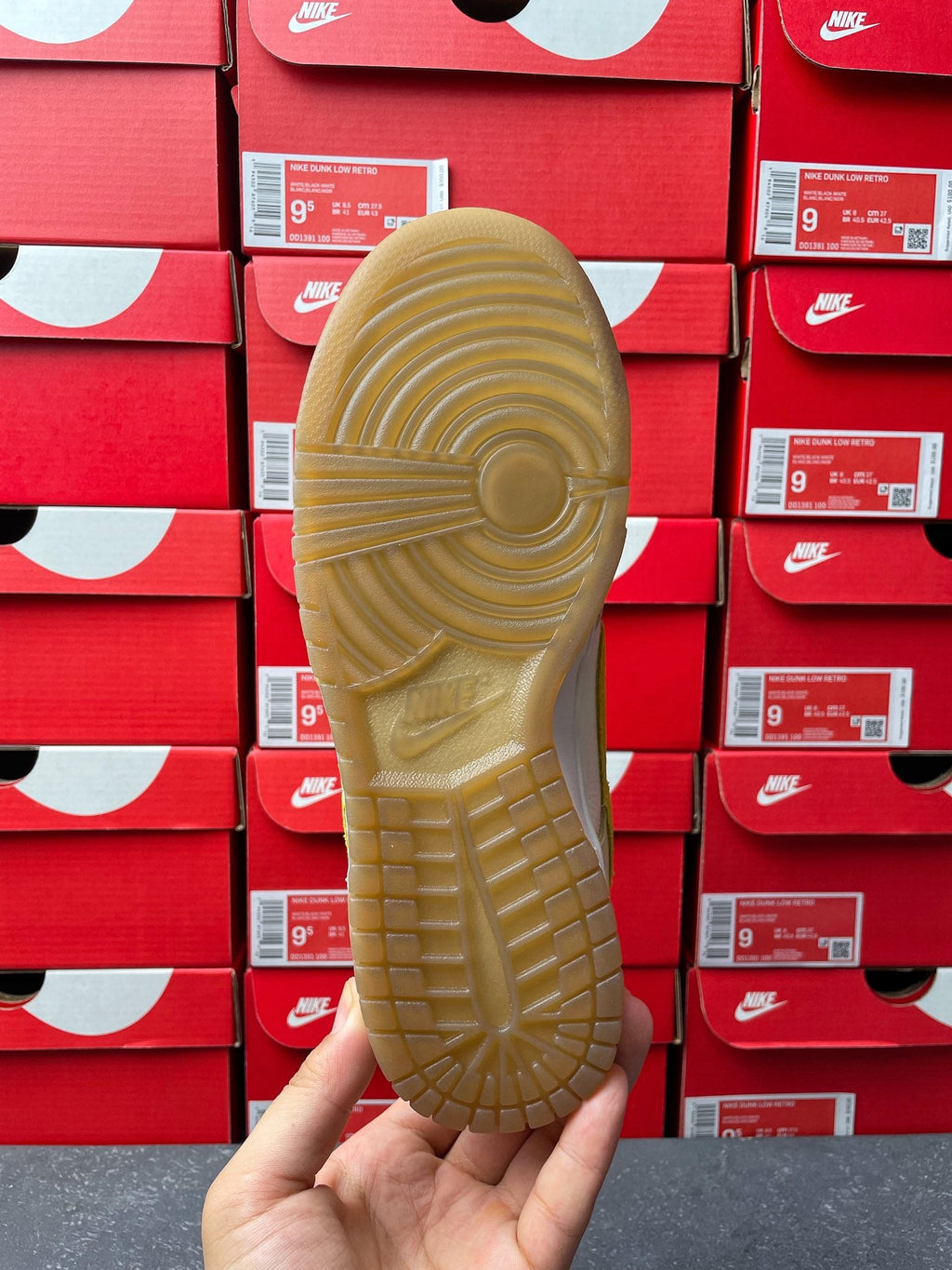 Nike Dunk Low sneaker, outsole view; textured cream rubber tread