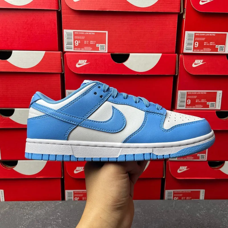 Blue and white Nike Dunk Low sneakers, front side view with lace-up and swoosh