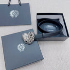Dark blue leather belt with ornate heart-shaped silver buckle