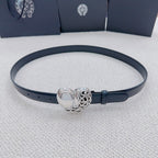 Dark blue belt with heart-shaped silver buckle and metal buckle clasp