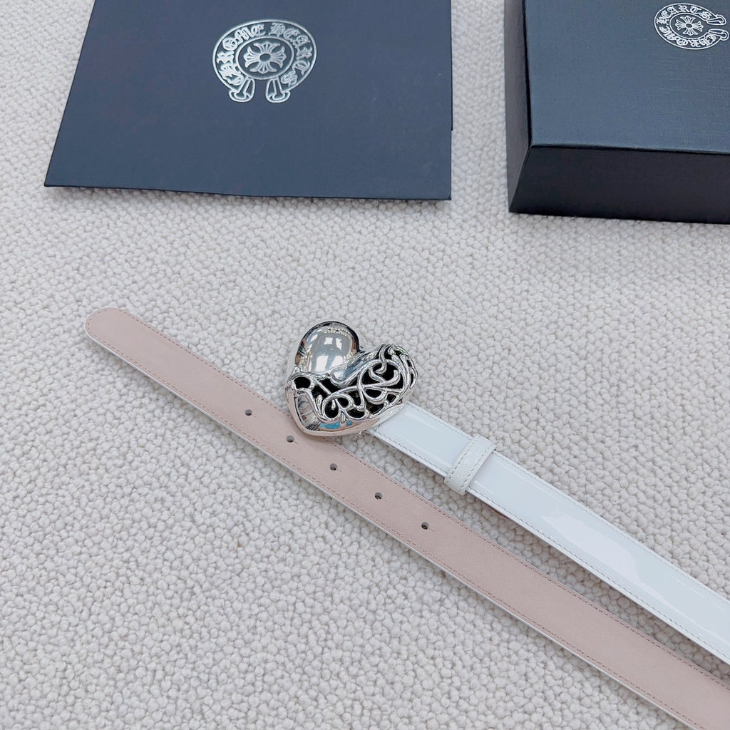 White belt with silver heart buckle and visible perforation holes