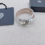 White belt with silver heart buckle, viewed as a wrapped loop