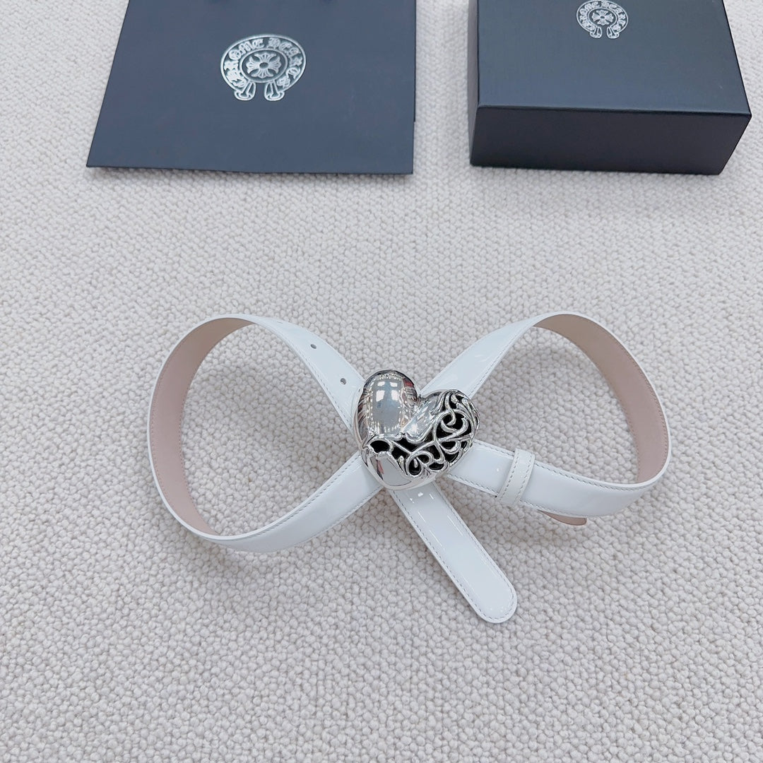 White belt with silver heart buckle and filigree details
