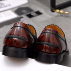 Versace leather loafers heel view, dark brown with black sole and stitching