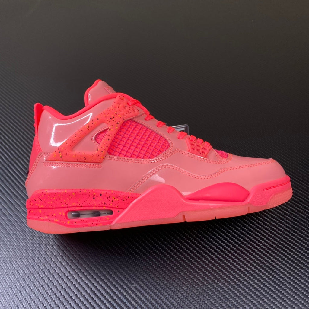 Pink Air Jordan 4 sneaker with mesh panels and visible Air unit