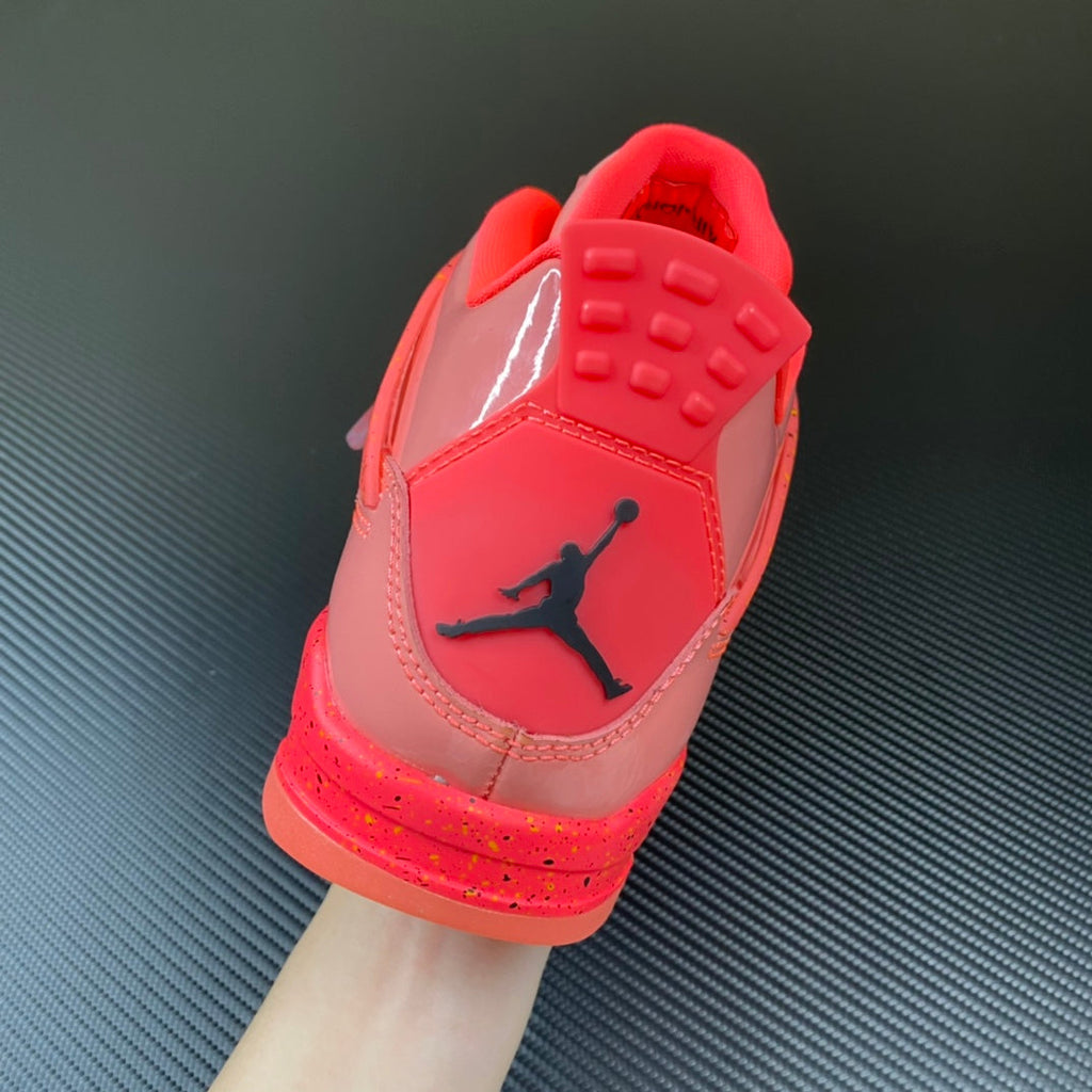 Pink Air Jordan 4 sneaker quarter panel with stitched Jumpman logo