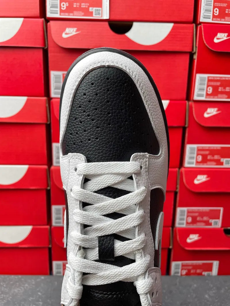 Nike Dunk Low sneakers, tongue and collar close-up with white laces