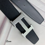 Black pebbled leather belt with silver H-style buckle, side view detail