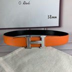 Orange leather belt with silver-tone H buckle, front view