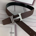 Hermes belt with silver H buckle and brown textured leather strap
