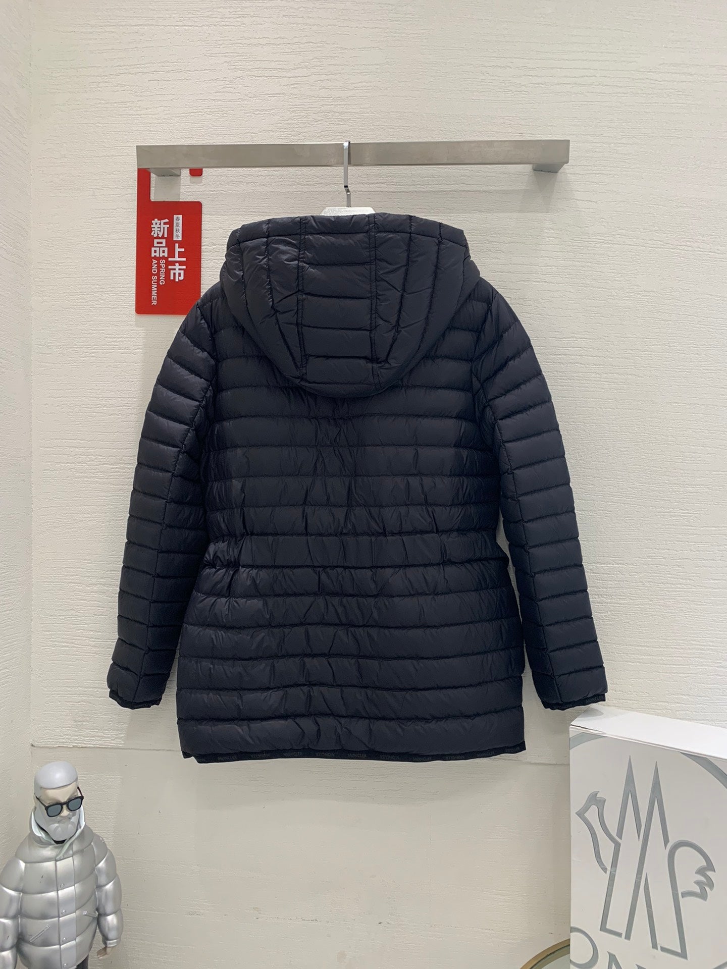Moncler hooded puffer jacket, dark with back view and quilted padded design