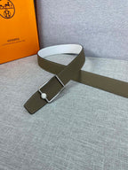 Hermes leather belt with olive strap and silver buckle with small round emblem