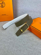 Hermes leather belt with olive strap and gold tone square buckle detail