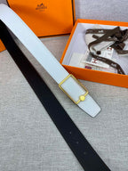 Light blue leather belt with gold buckle and keeper tab, shown with belt length.