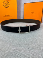 Hermes belt in dark smooth leather with silver rectangular buckle