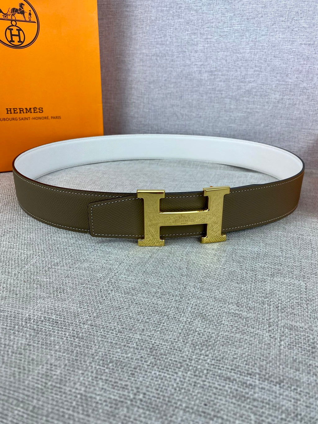 Olive leather belt with gold-tone rectangular buckle and white lining