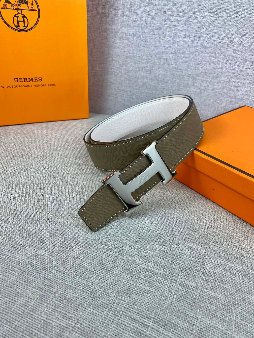 Olive leather Hermes-style belt with wide strap and metal buckle
