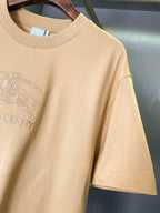 Tan Burberry T-shirt with chest horse rider emblem