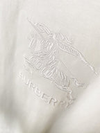 Embossed horse-and-rider graphic with “BURBERRY” text on white T-shirt