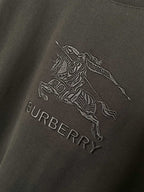 Black T-shirt with horse rider logo and BURBERRY text graphic