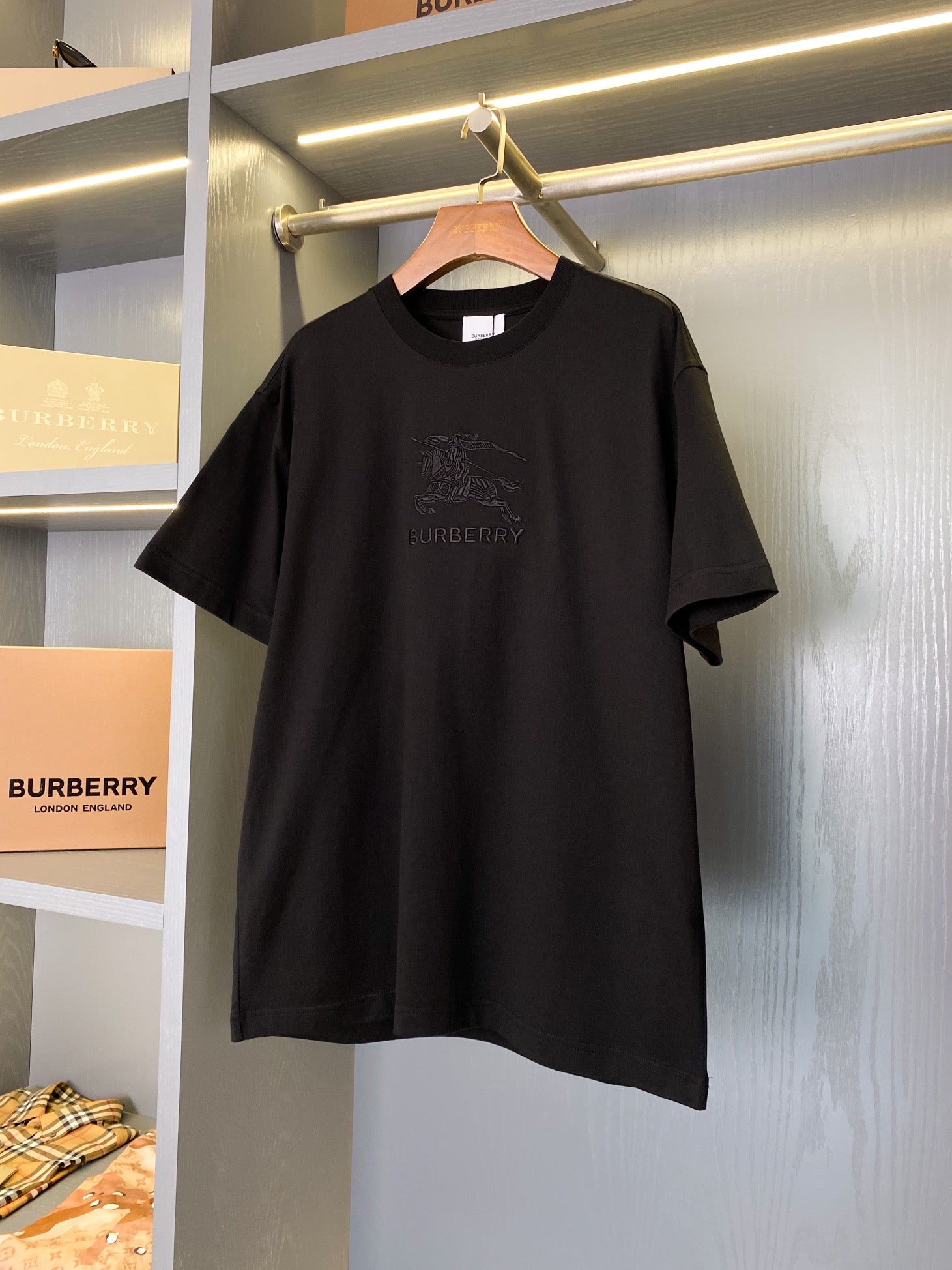 Black crew-neck T-shirt with horse rider logo and BURBERRY graphic