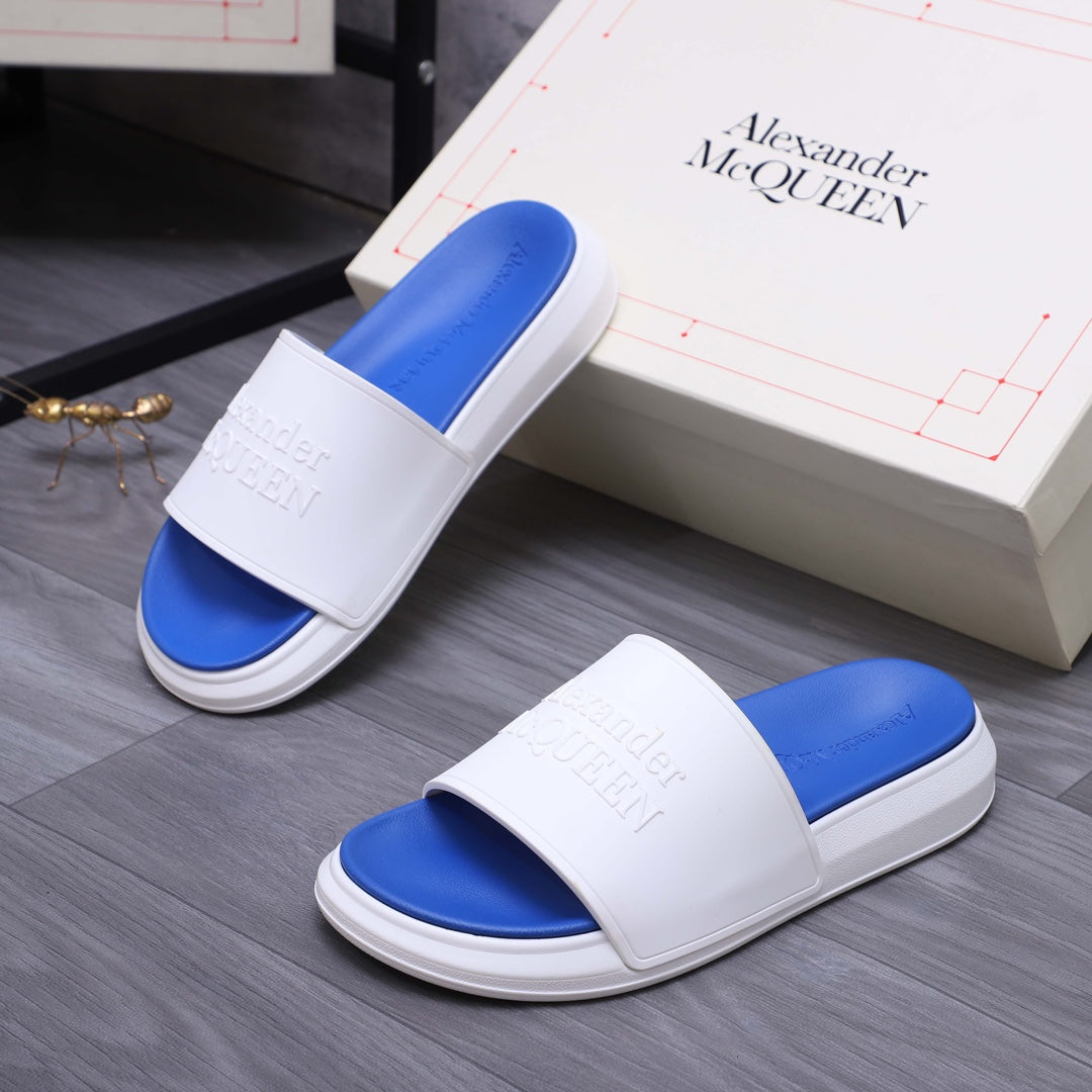 Alexander McQueen slides, white strap and blue footbed with textured edge sole