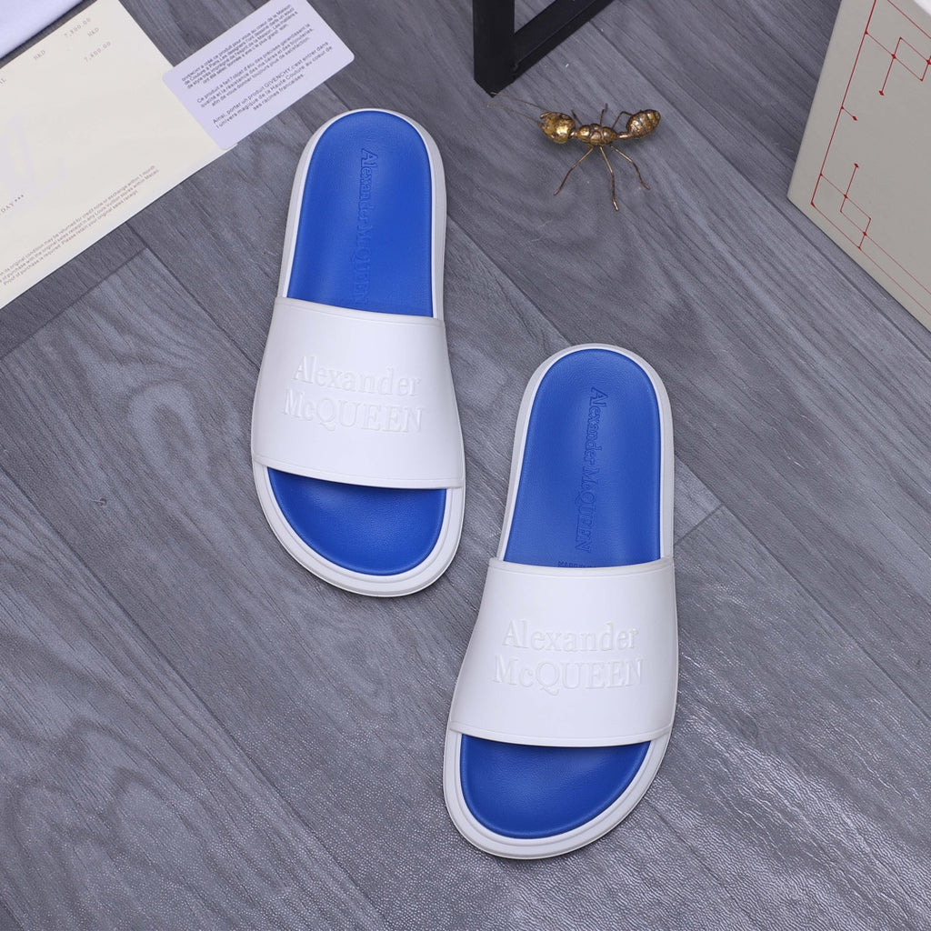 Alexander McQueen slides, white band and blue insole, pair side-by-side