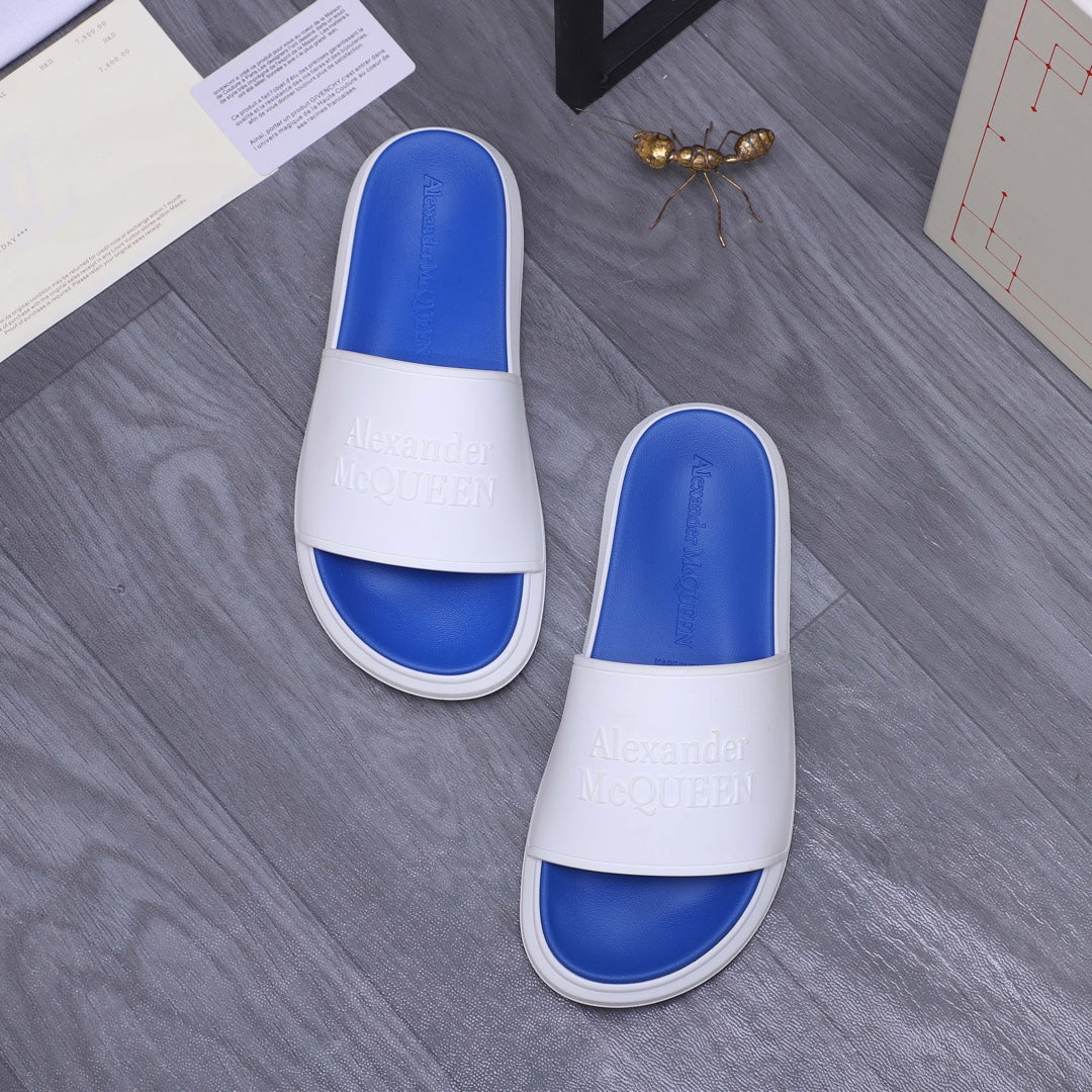 Alexander McQueen slides, white band and blue insole, pair side-by-side